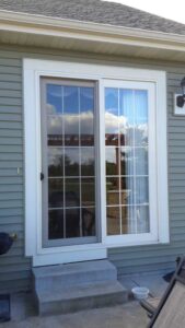 5 ways a new ProVia door can increase your home's value, modern ProVia front door with decorative glass, beautiful front entry door on Wisconsin home